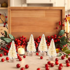 Festive mini trees - Breng in één keer warme kerstsfeer in huis met 8 mini kerstboompjes in verschillende formaten.